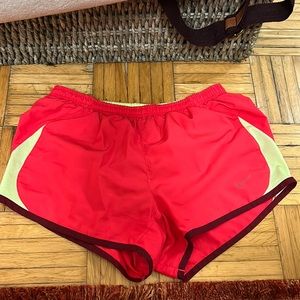 Pink and lime green Nike shorts